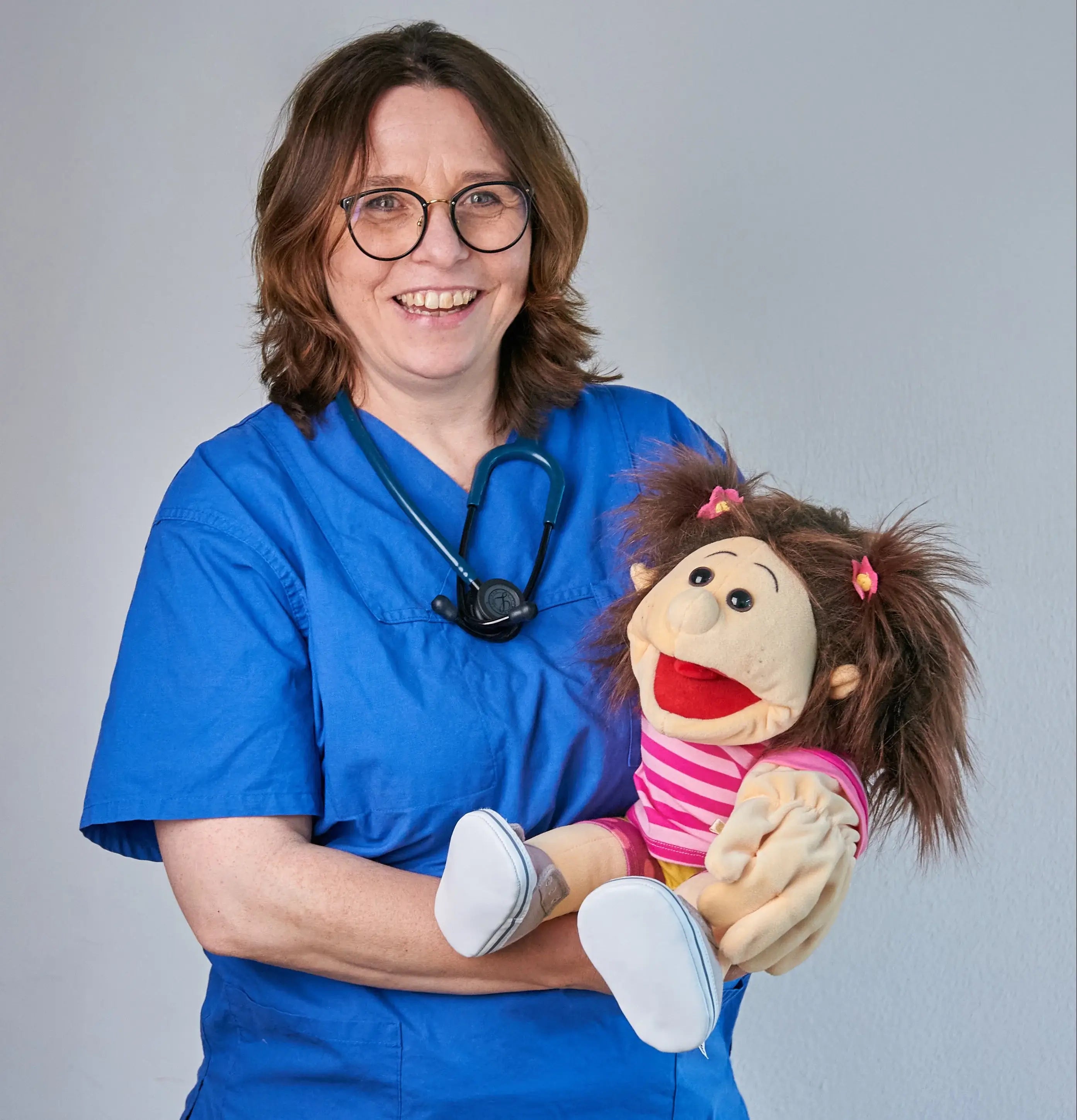 Hero Banner Katrin und Puppe